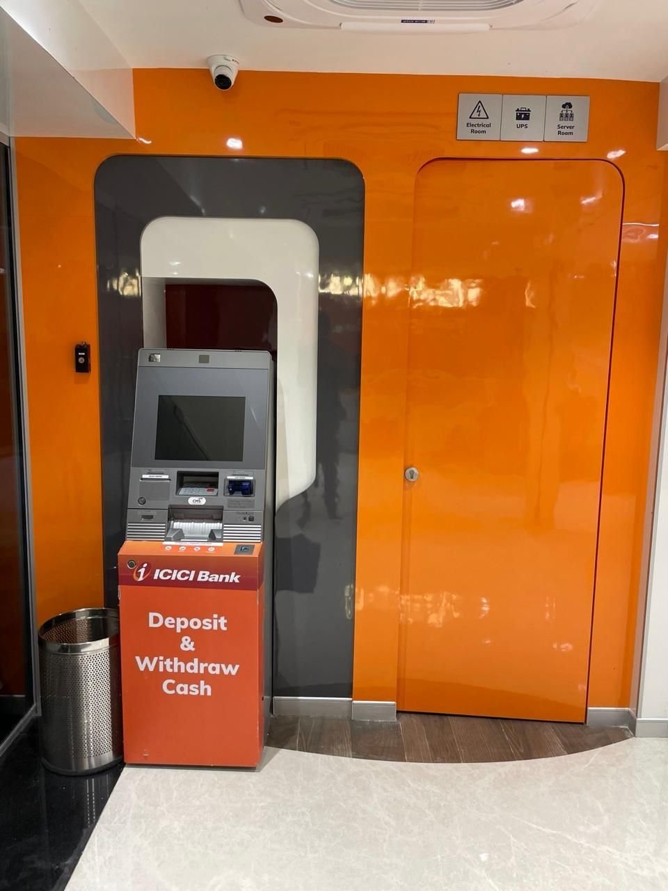 ATM lobby with orange glass entrance