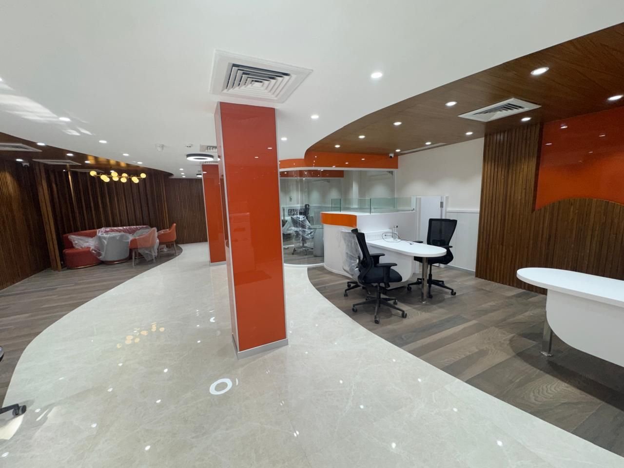 ICICI Bank R T Nagar branch reception with curved orange columns